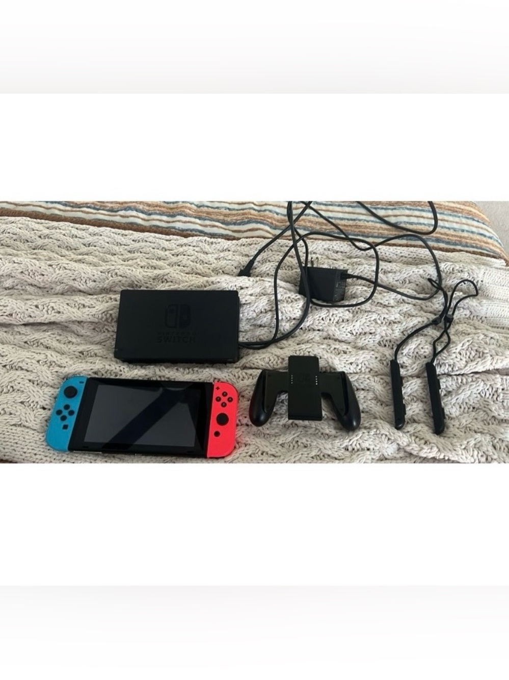 Nintendo Switch with Neon Blue and Neon Red Joy-Con Controllers